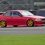 Red BMW E36 318is Coupe M487MYF