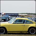 Yellow Porsche 911 at the Silverstone Classic 2013