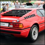 Red BMW M1 at the Silverstone Classic 2013