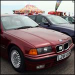 Red BMW E36 at the Silverstone Classic 2013