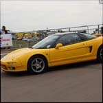 Yellow Honda NSX at the Silverstone Classic 2013