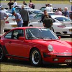 Red Porsche 911 EET911 at the Silverstone Classic 2013