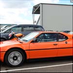 Orange BMW M1 PPR725W at the Silverstone Classic 2013