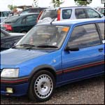 Blue Peugeot 205 GTI 1.6 at the Silverstone Classic 2013